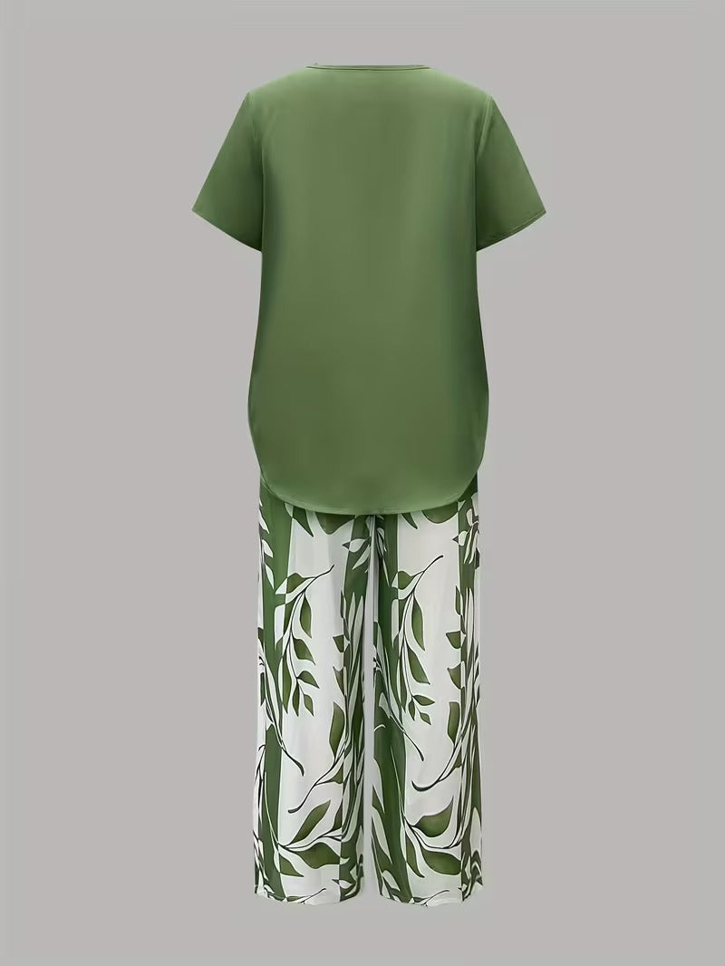 Leaf print women's 2-piece outfit: short sleeve top & cropped pants. Stylish and comfortable for summer.