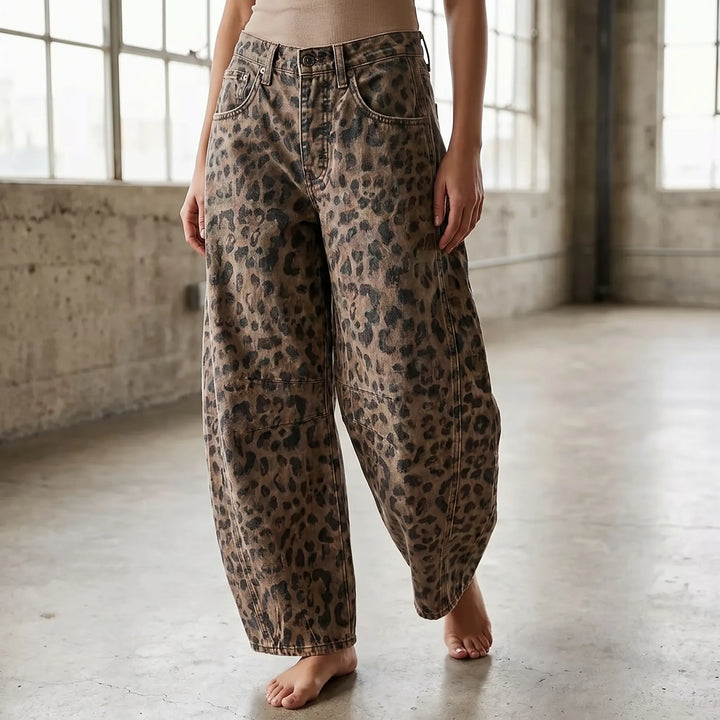 Women's leopard-print barrel jeans, relaxed fit mid-rise, perfect for casual streetwear and vintage style.