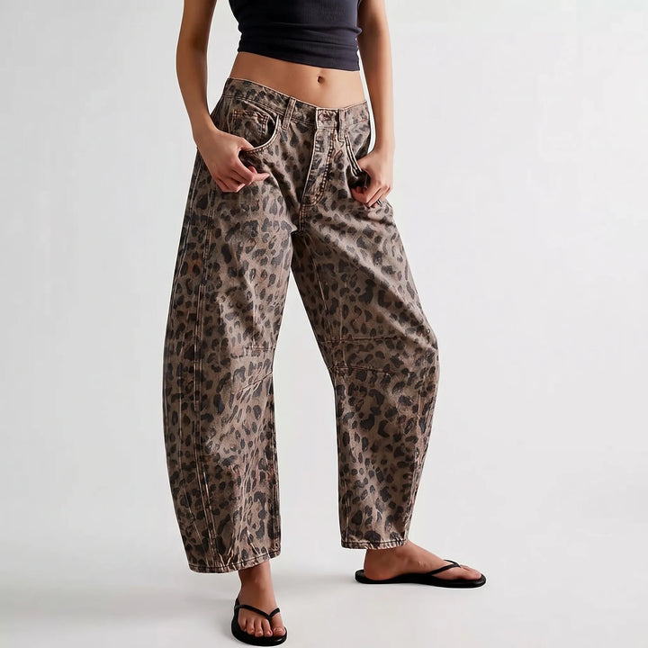 Comfortable women's barrel jeans in stylish leopard print, featuring a relaxed mid-rise and trendy ankle length.