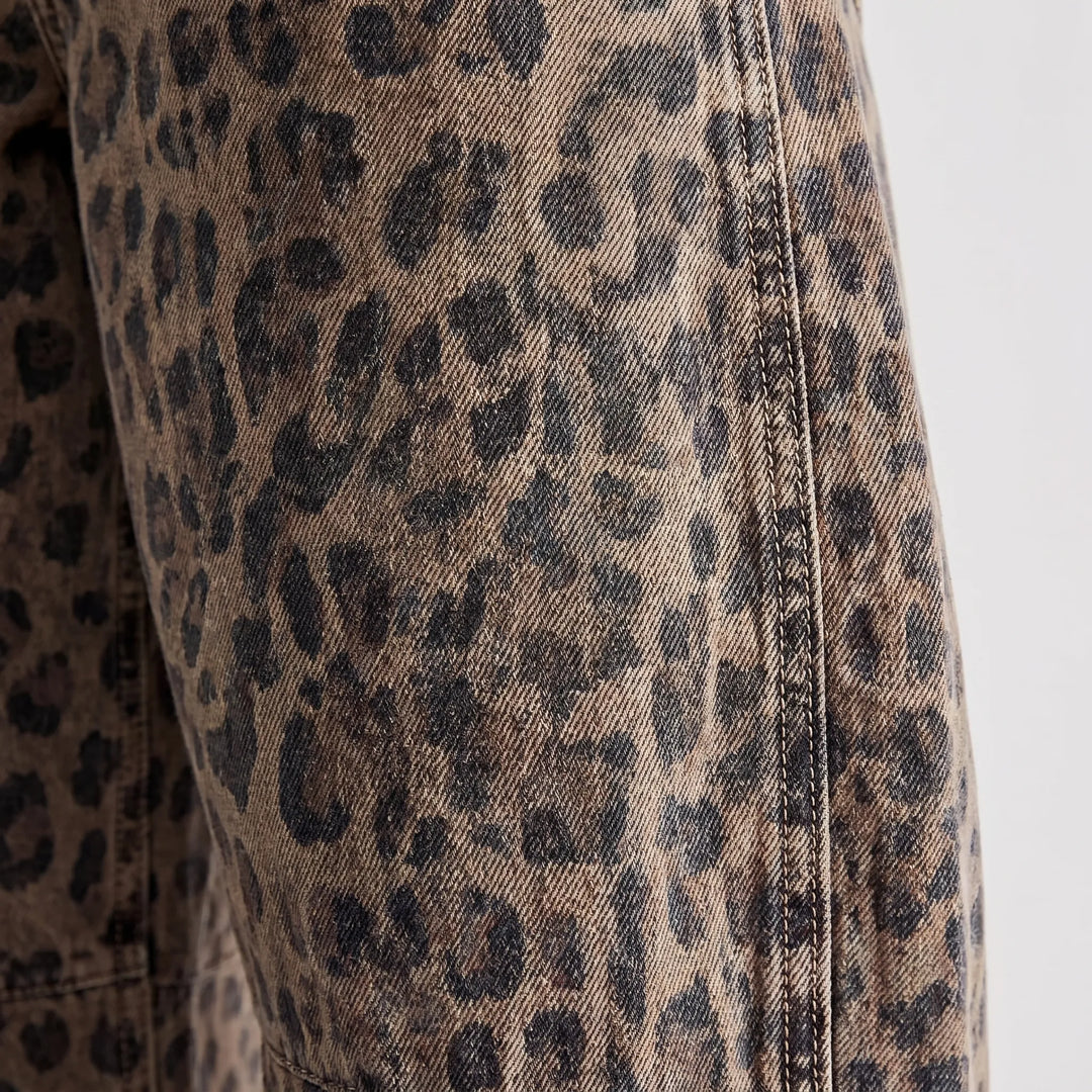 Brown leopard print barrel jeans for women, a bold statement piece with a relaxed fit and streetwear appeal.
