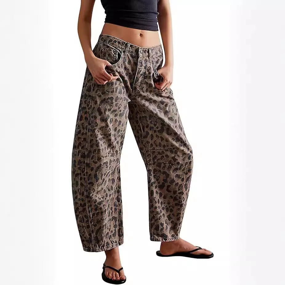 Fashionable women's patterned denim barrel jeans, a chic leopard print with a relaxed, ankle-length fit.