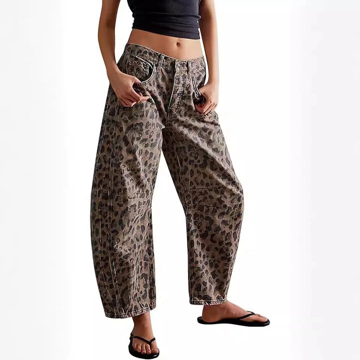 Fashionable women's patterned denim barrel jeans, a chic leopard print with a relaxed, ankle-length fit.