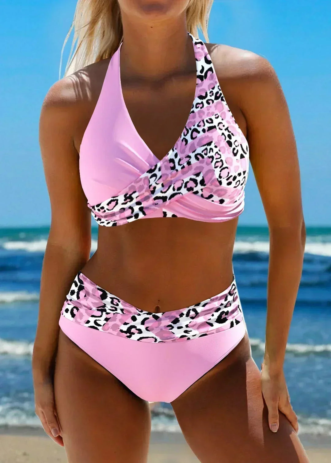 Chic women's leopard print halter neck high waist bikini set, perfect textured swimsuit for beach vacation.