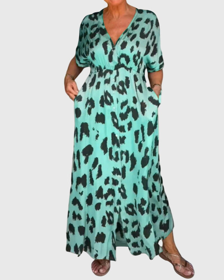 Elegant women's leopard print V-neck maxi dress with full button front, suitable for any casual or evening wear.