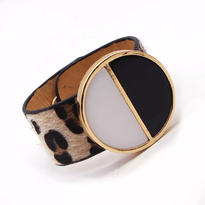 Women's leopard print wrap bracelet, fierce and stylish, perfect as a fashion statement jewelry piece.
