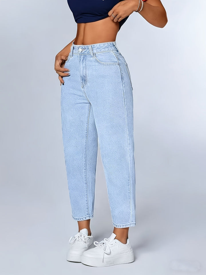 Light wash women's mom jeans, high waist, relaxed fit, tapered leg & cuffed hem. Retro casual everyday wear.