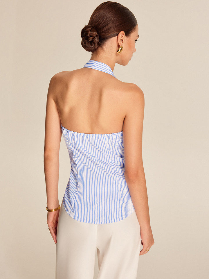 Versatile women's light blue striped halter blouse featuring a tie-front. Perfect elegant top for office & summer.