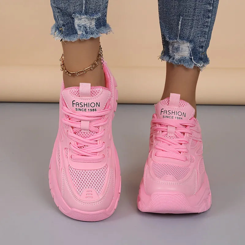 Breathable women's athletic walking shoes, lightweight comfort with a stylish platform sole.