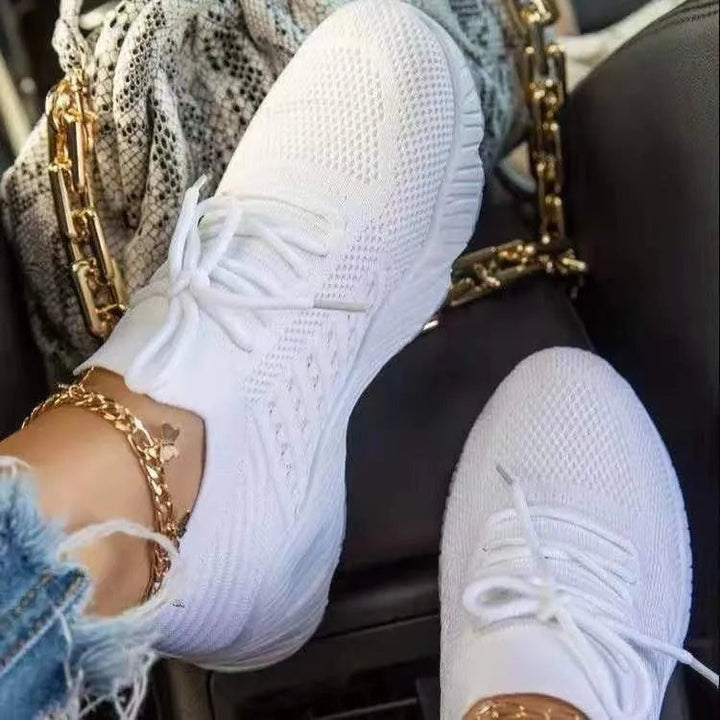 Non-slip women's comfort sneakers, perfect for athletic activities & versatile wear.