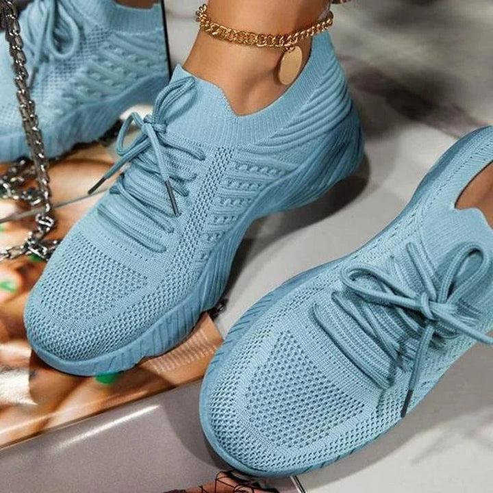 Non-slip, lightweight women's sneakers designed for comfort during walking & casual use.