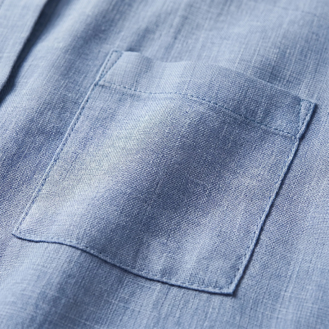 Versatile women's button-up shirt, ideal for layering or as a casual top. Lightweight & classic for any occasion.