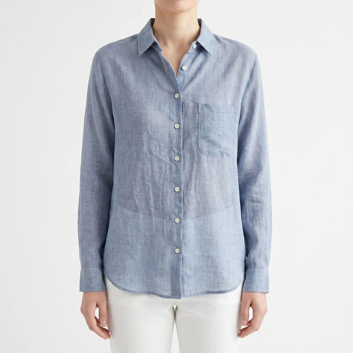 Classic women's long sleeve button-up shirt, designed for a relaxed fit and lightweight, breathable comfort.