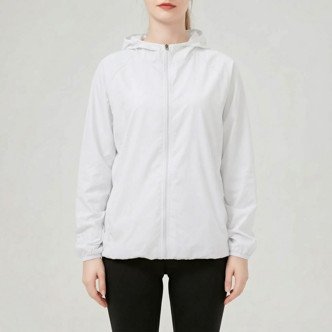 Women's athletic hooded jacket, packable and lightweight for active outdoor adventures.