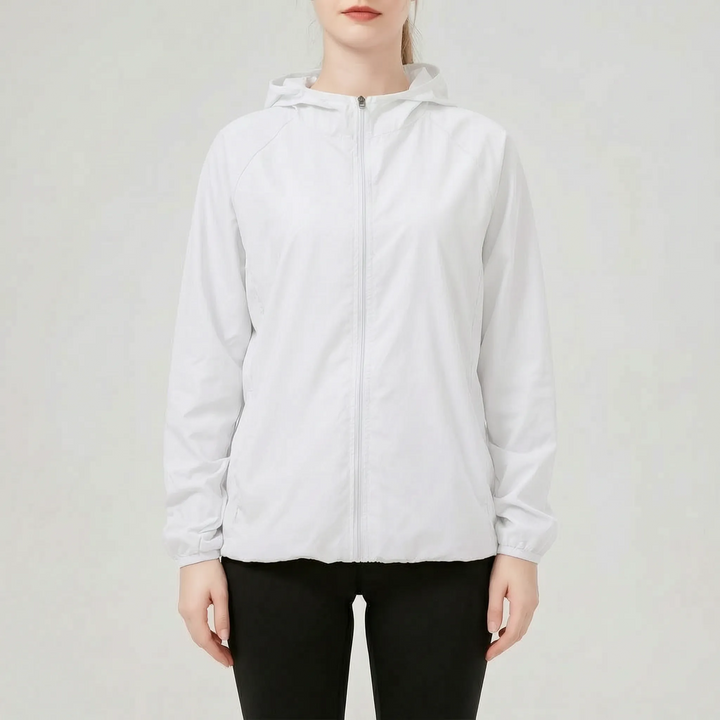 Women's athletic hooded jacket, packable and lightweight for active outdoor adventures.