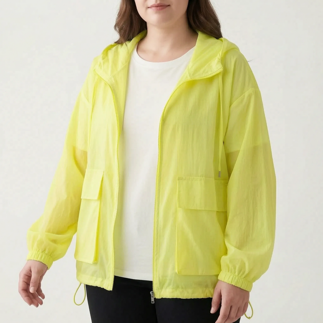 Stylish women's full-zip athletic jacket with hood, offering lightweight comfort for any active lifestyle.