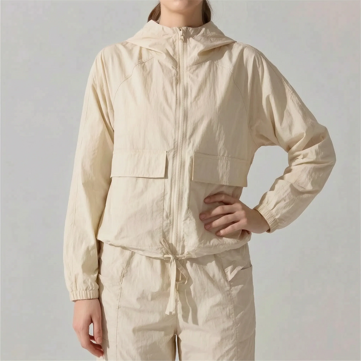 Stylish women's hooded activewear jacket for hiking & outdoor sports. Lightweight and comfortable.