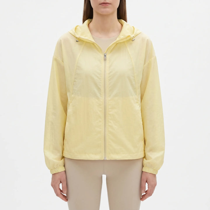 Stylish women's spring/summer hooded windbreaker, perfect lightweight jacket for casual outdoor activities.