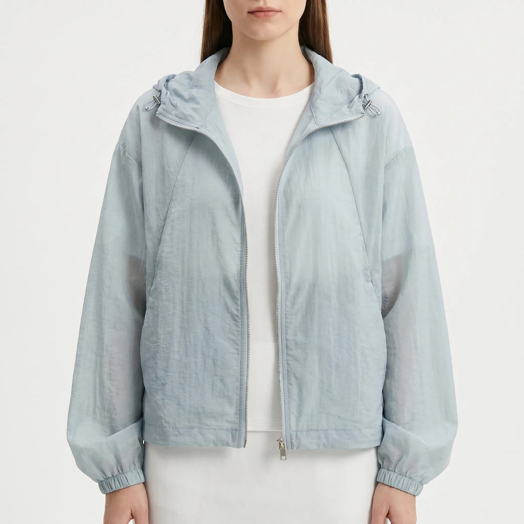 Versatile women's full-zip hooded windbreaker, ideal as a light spring jacket or summer outerwear.