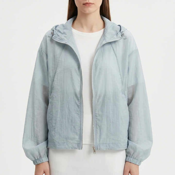 Versatile women's full-zip hooded windbreaker, ideal as a light spring jacket or summer outerwear.