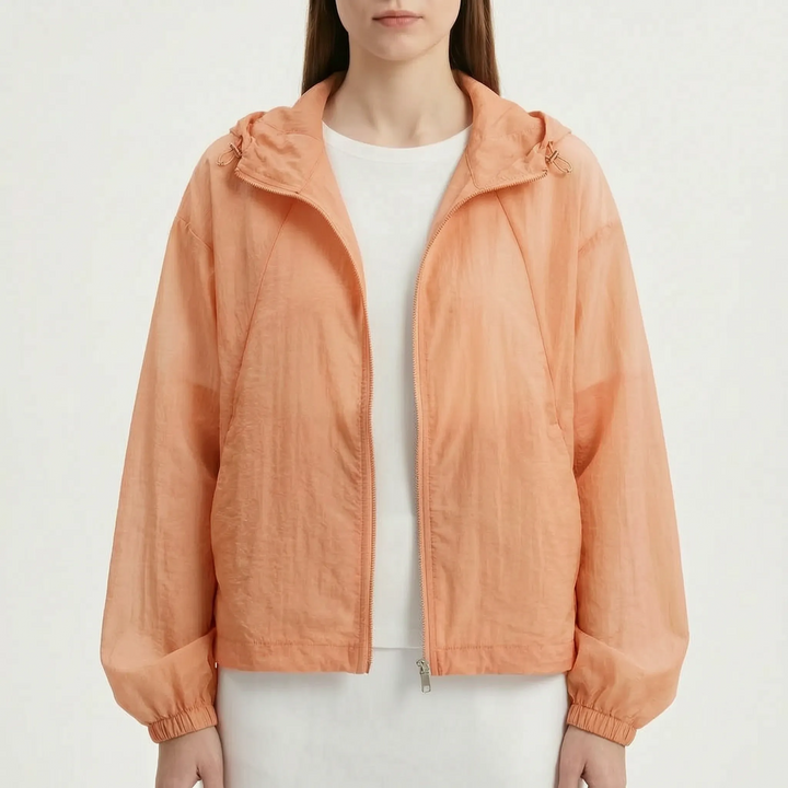 Women's activewear hooded windbreaker, lightweight full-zip jacket with pockets, perfect for spring/summer.