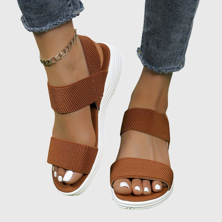 Women's casual orthopedic sandals with adjustable straps, arch support, and slip-resistant grip.