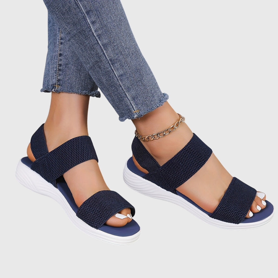 Stylish women's casual sandals, offering adjustable arch support & lightweight comfort for walking.