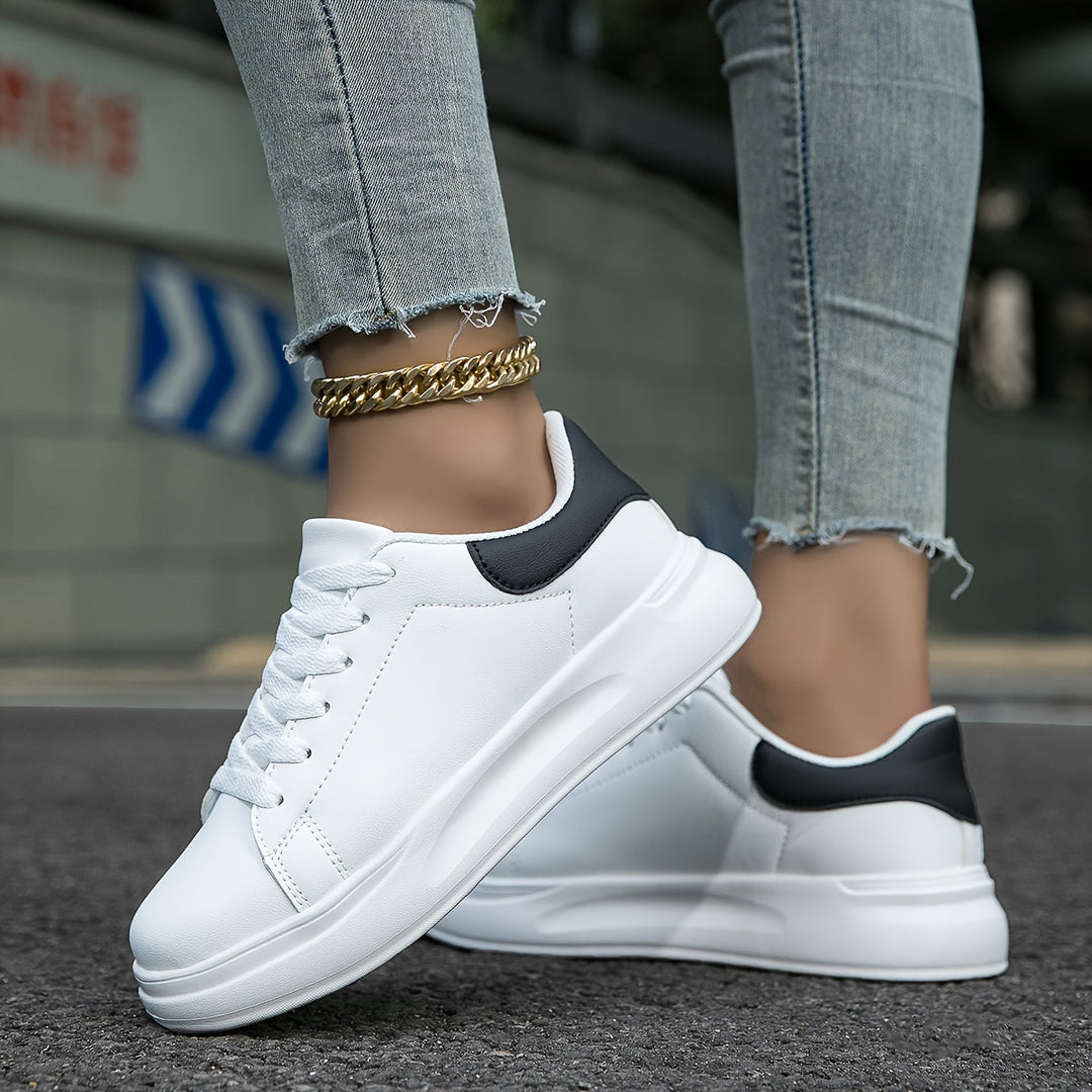 Stylish women's lightweight lace-up sneakers with breathable fabric & orthopedic cushioning.