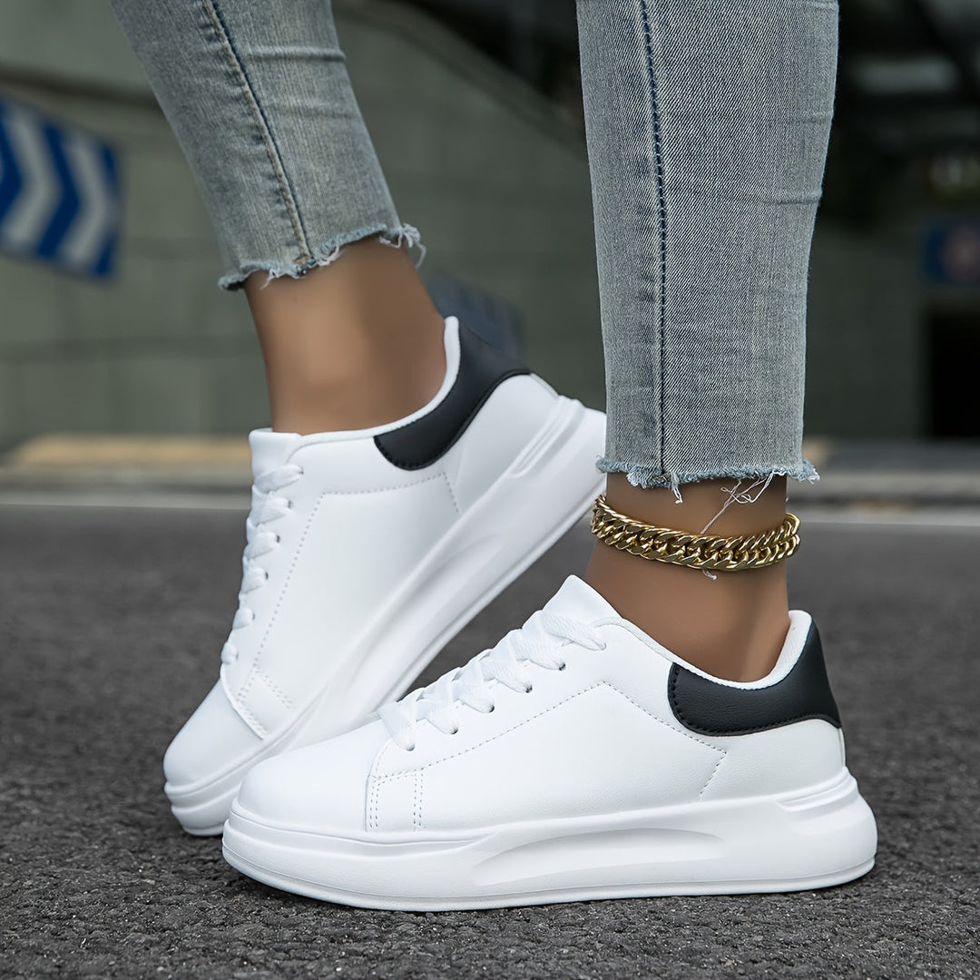 Side profile of women's lightweight orthopedic comfort sneakers, engineered for daily support.