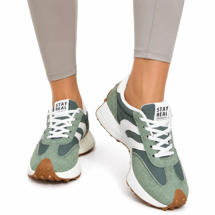 Breathable women's comfort trainers, ensuring arch support & wide toe comfort.