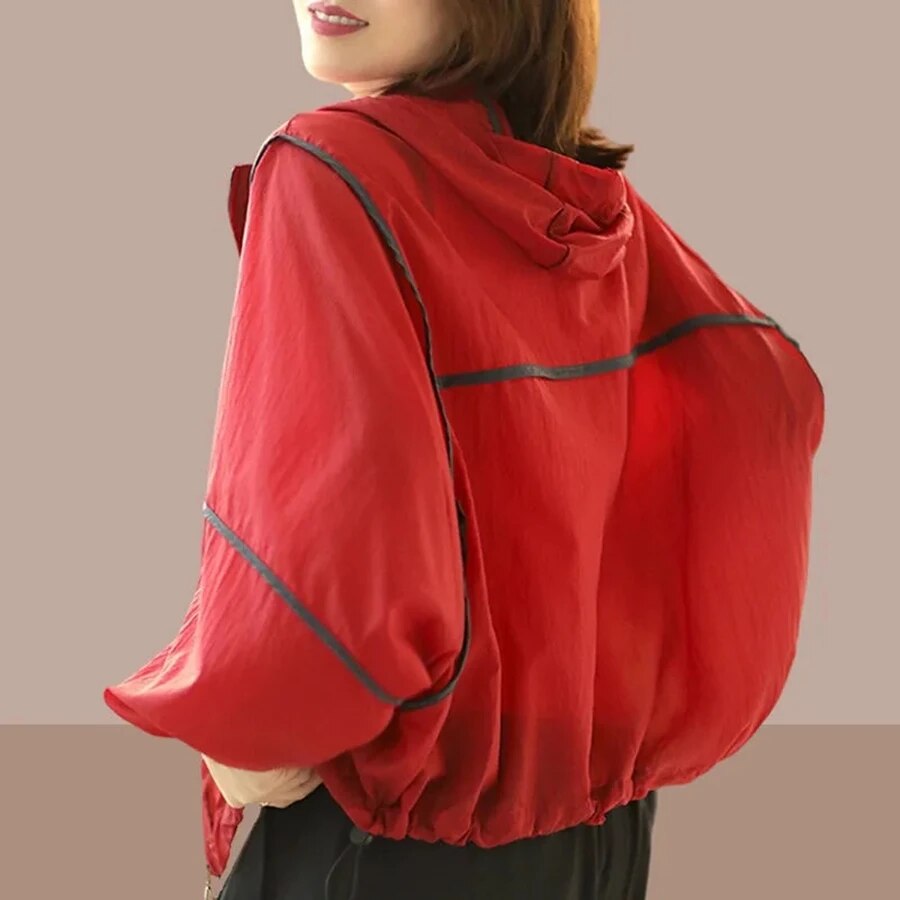 Comfortable women's lightweight summer hoodie jacket with an oversized fit, great for outdoor fashion & layering.