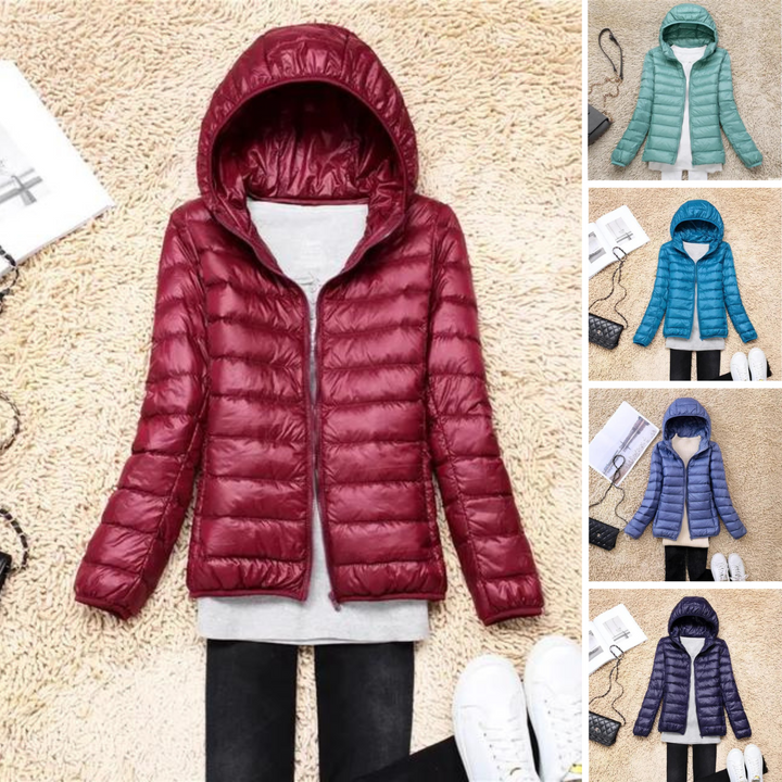 Full body shot of model wearing women's lightweight packable puffer jacket, ideal winter coat.