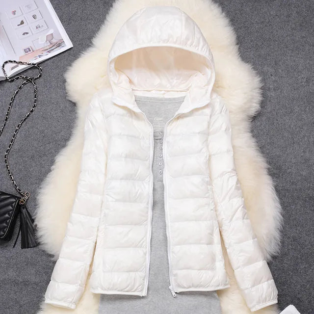 Front view of women's warm hooded puffer jacket, perfect casual outerwear for winter.