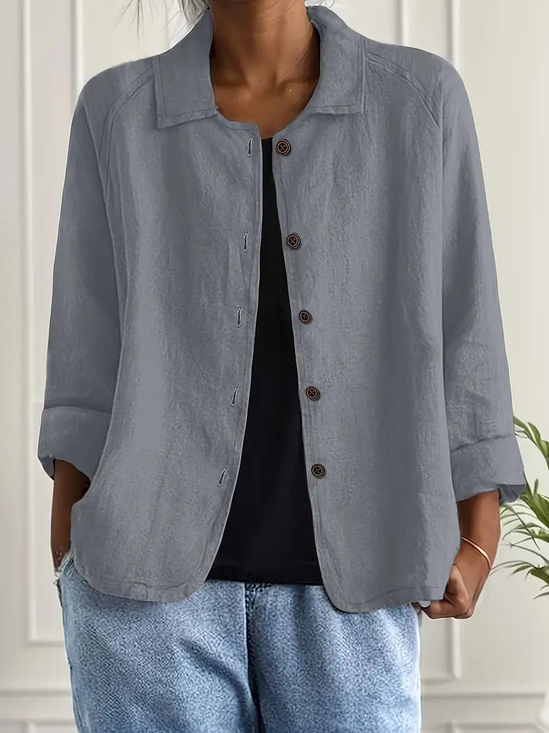 Button-down women's cardigan, an elegant and comfortable layering piece.