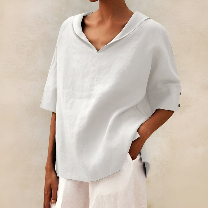 Women's lightweight short sleeve blouse for everyday comfort. Casual, chic summer fashion top.