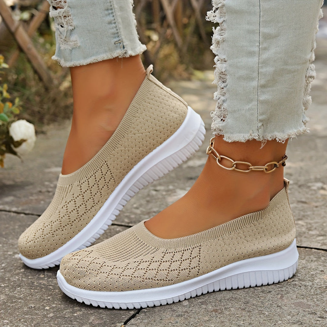 Comfortable women's slip-on walking shoes, ideal for travel, summer, and light athletic activities.
