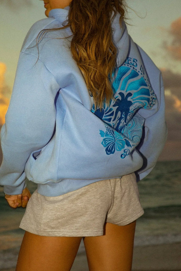 Breathable blue women's summer hoodie. Lightweight design for comfort & casual style. Ideal for warm weather layering.