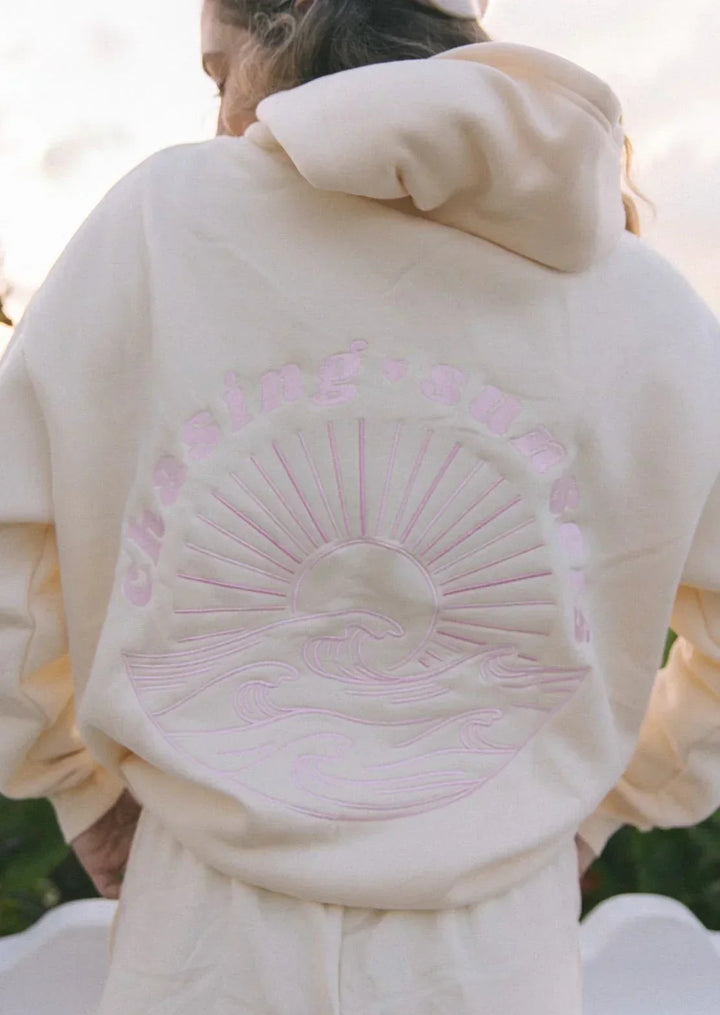 Cream women's lightweight hoodie, perfect for summer. Breathable fabric offers comfort for casual wear & stylish layering.