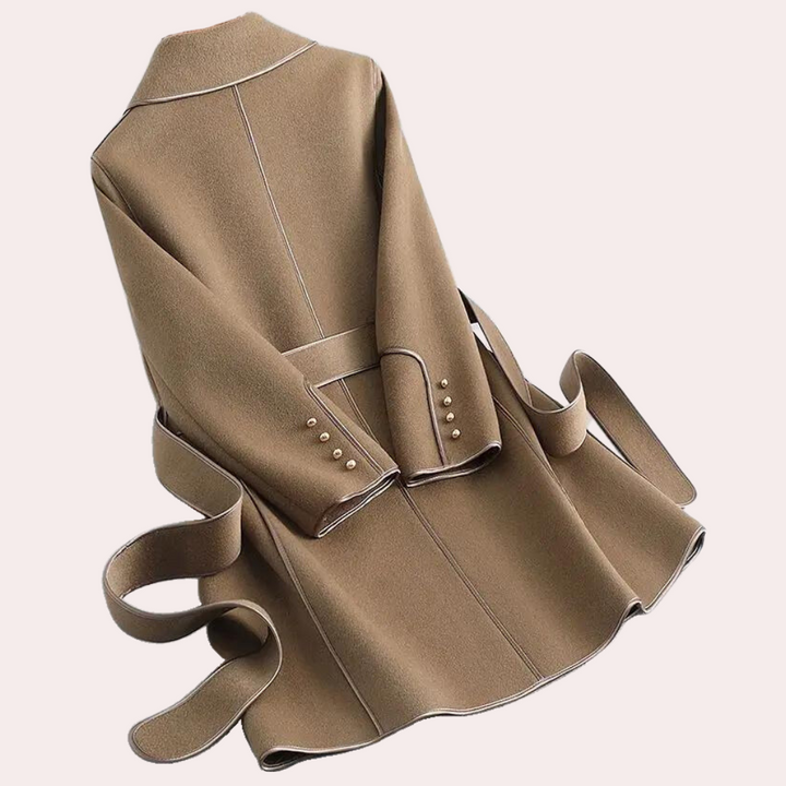 Elegant women's trenchcoat, lightweight and stylish. Ideal for sophisticated casual or evening outerwear.