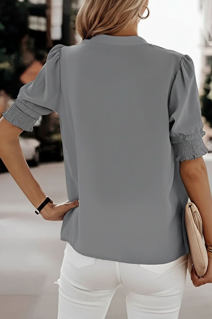Summer style women's V-neck blouse with puff sleeves, ideal for both casual and office looks.