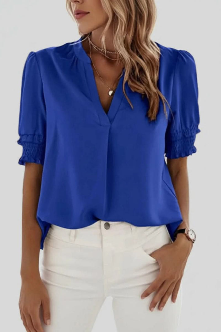 Chic women's V-neck puff sleeve blouse, a lightweight and feminine short sleeve top for any occasion.