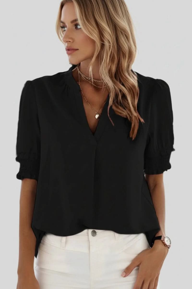 Elegant lightweight V-neck blouse for women, featuring trendy puff sleeves and a comfortable loose fit.