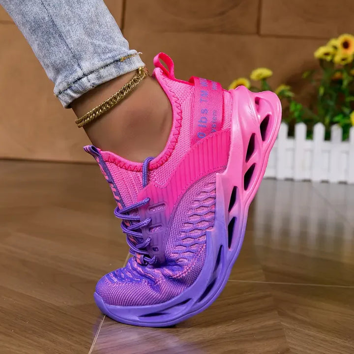 Comfortable women's athletic shoes with breathable mesh for lightweight daily wear.