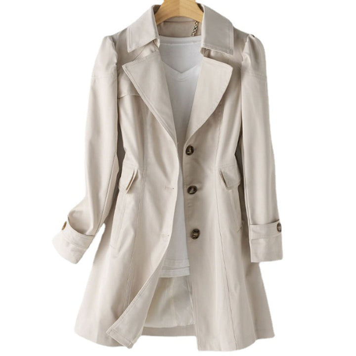 Stylish women's hooded windbreaker, perfect for spring/fall. Lightweight & rain-resistant with adjustable fit.