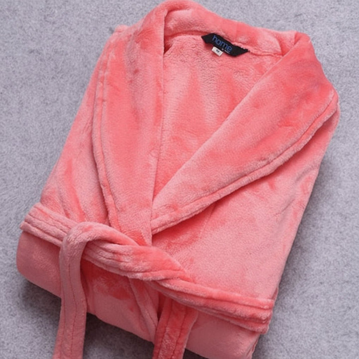 Cozy women's lightweight winter bathrobe, perfect loungewear, featuring a belt and pockets for relaxation.