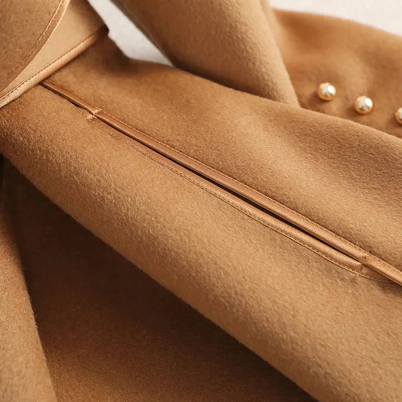 Versatile women's long trench coat with belt, ideal as formal or casual elegant outerwear.