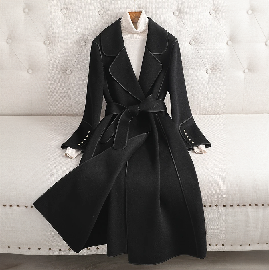 Formal women's long belted trench coat, a classic tailored outerwear for any elegant occasion.