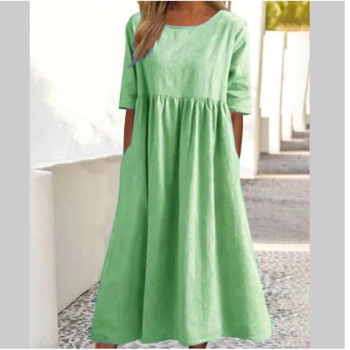 Stylish women's maxi dress, featuring comfortable half-sleeves and convenient pockets. Great for casual summer outfits.