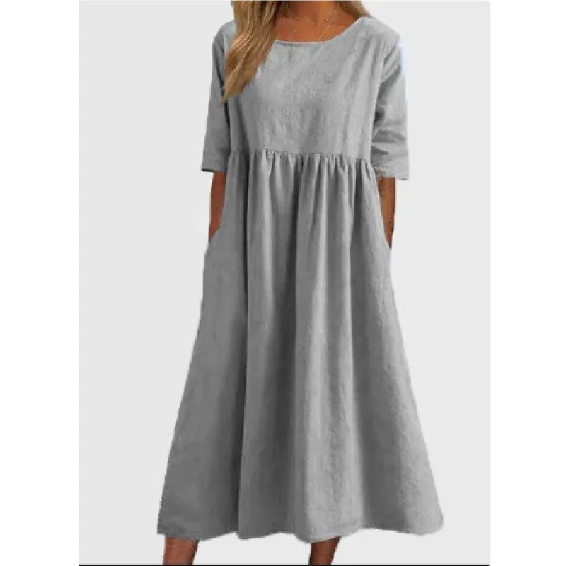 Comfortable women's long maxi dress. Relaxed half-sleeves & practical pockets make it ideal for modest daily wear.