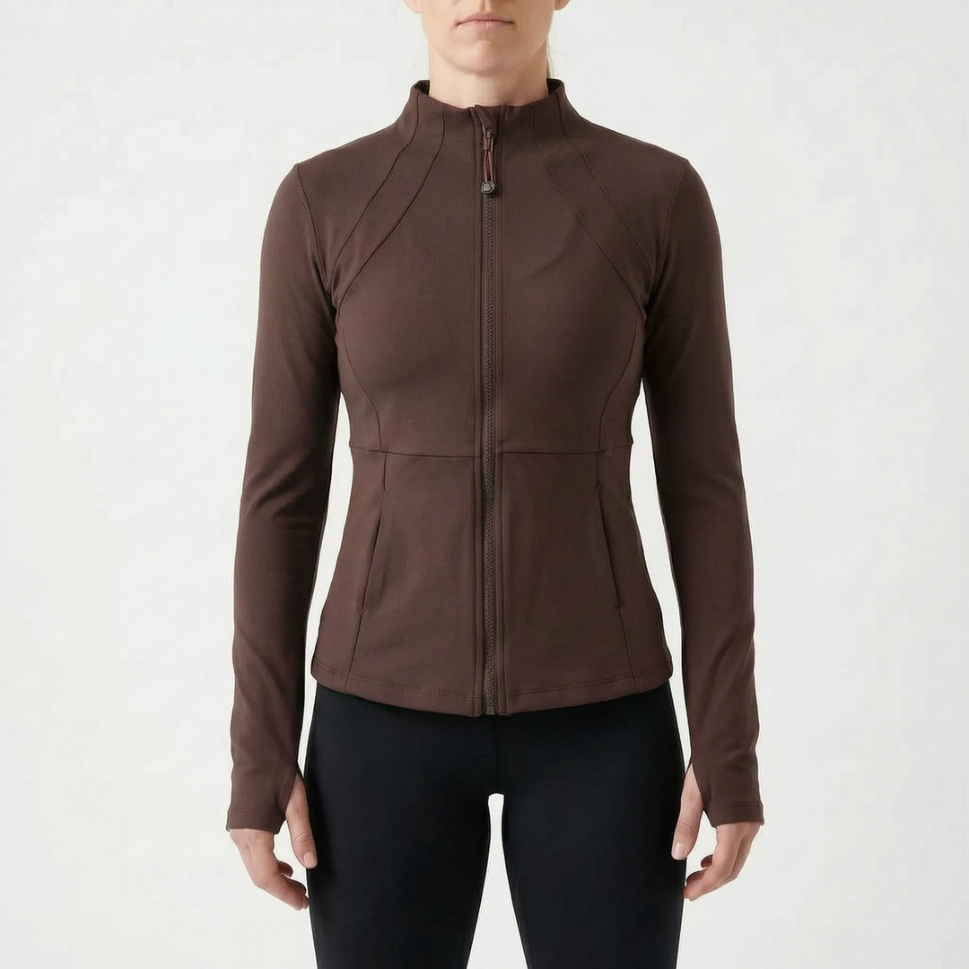 Women's fitted gym wear jacket with thumbholes, offering warmth and flexibility for intense workouts.