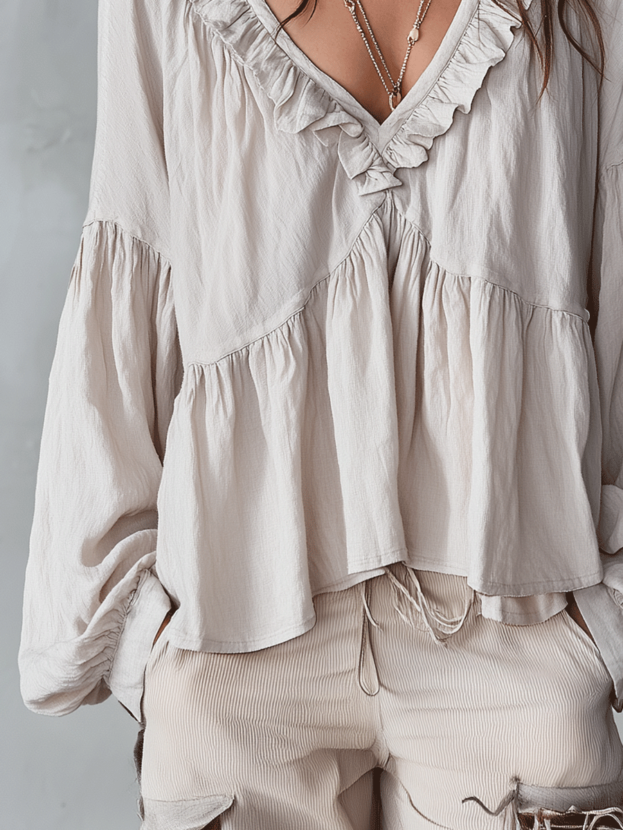 Beautiful women's long sleeve bohemian blouse. Loose fit ruffle top, elegant and versatile for spring.